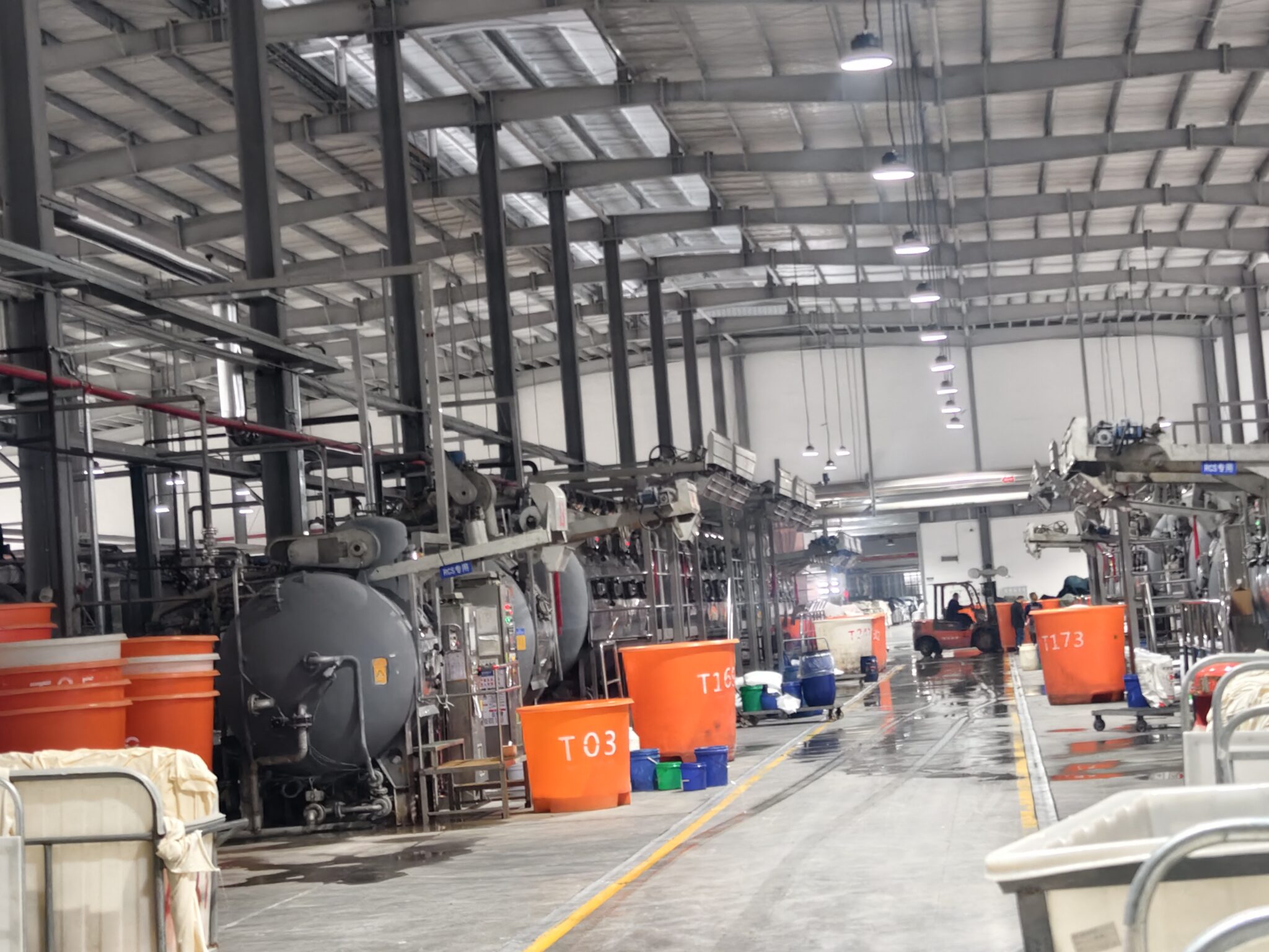 Industrial fabric dyeing equipment in a textile mill