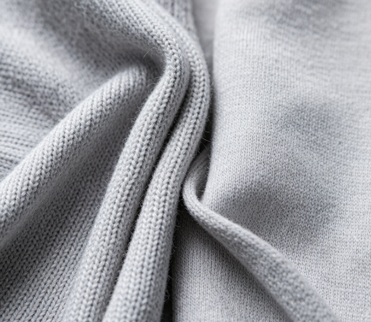 Close-up of single jersey knit fabric showing distinct face and back sides