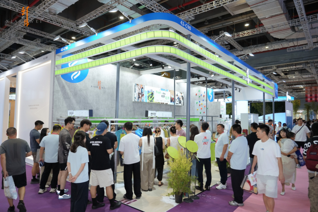 Wide view of the Mibein exhibition booth crowded with visitors at Intertextile Shanghai 2026
